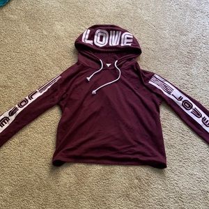 Maroon cropped hoodie shirt.